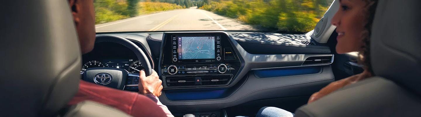 "Interior dash view of a 2022 Toyota Highlander driving