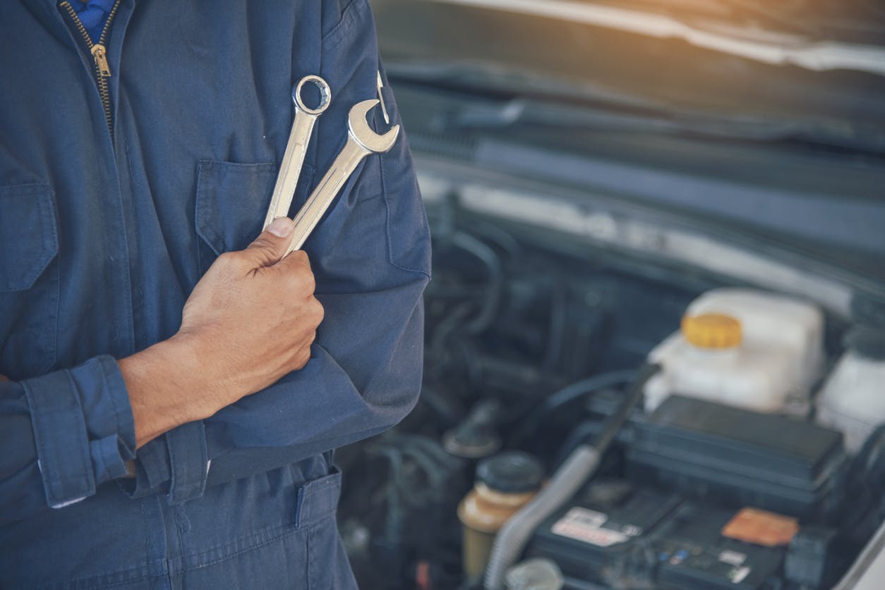 Mechanic car service auto garage in automotive mobile center. Technician workshop repair engine motor vehicles service mechanical engineering business. Automobile mechanic hands car repairs technic