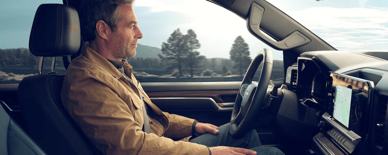 man in front seat of 2022 silverado supercruise