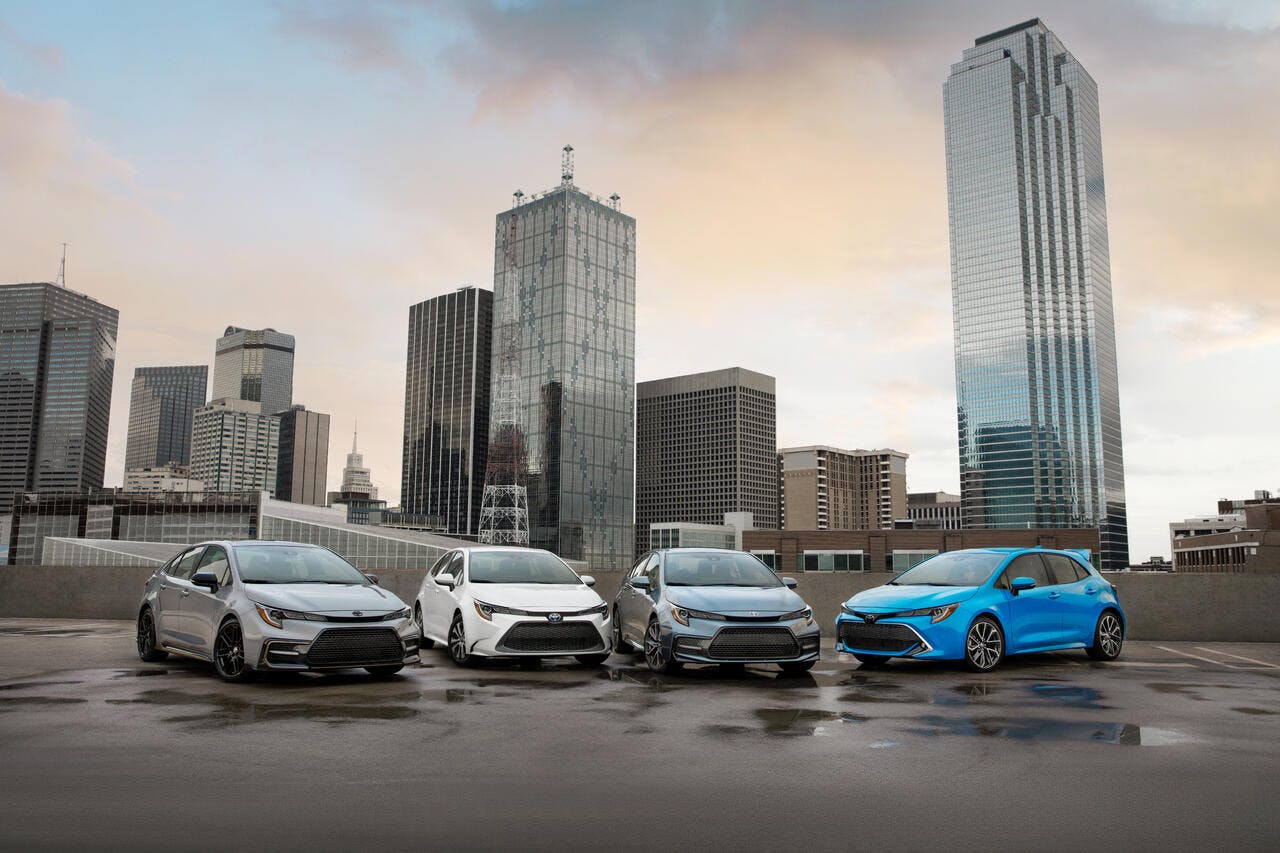 several Toyota Corolla models in the city