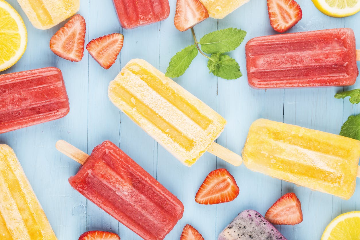 colorful popsicles and berries