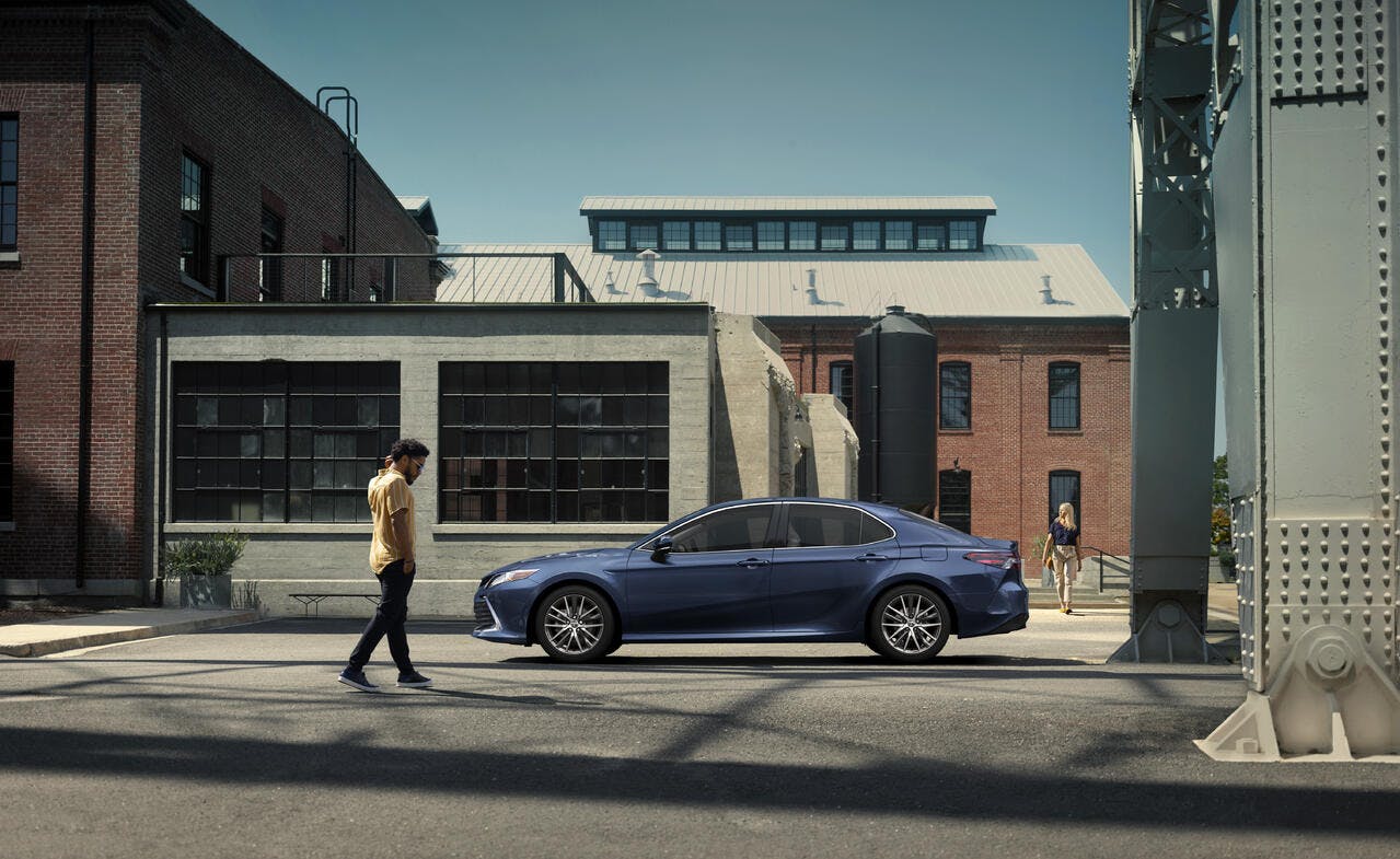 blue Toyota Camry car in town