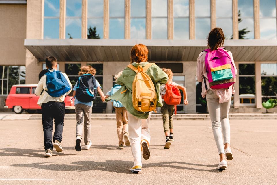 School children going back to school