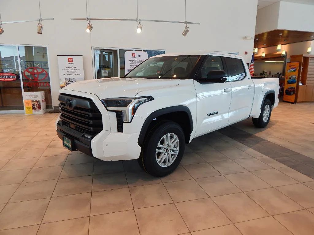 new white Toyota truck in showroom