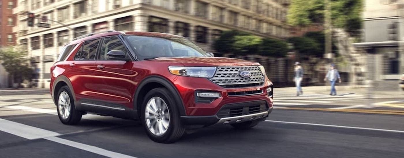 A red 2020 Ford Explorer is shown from the front at an angle.