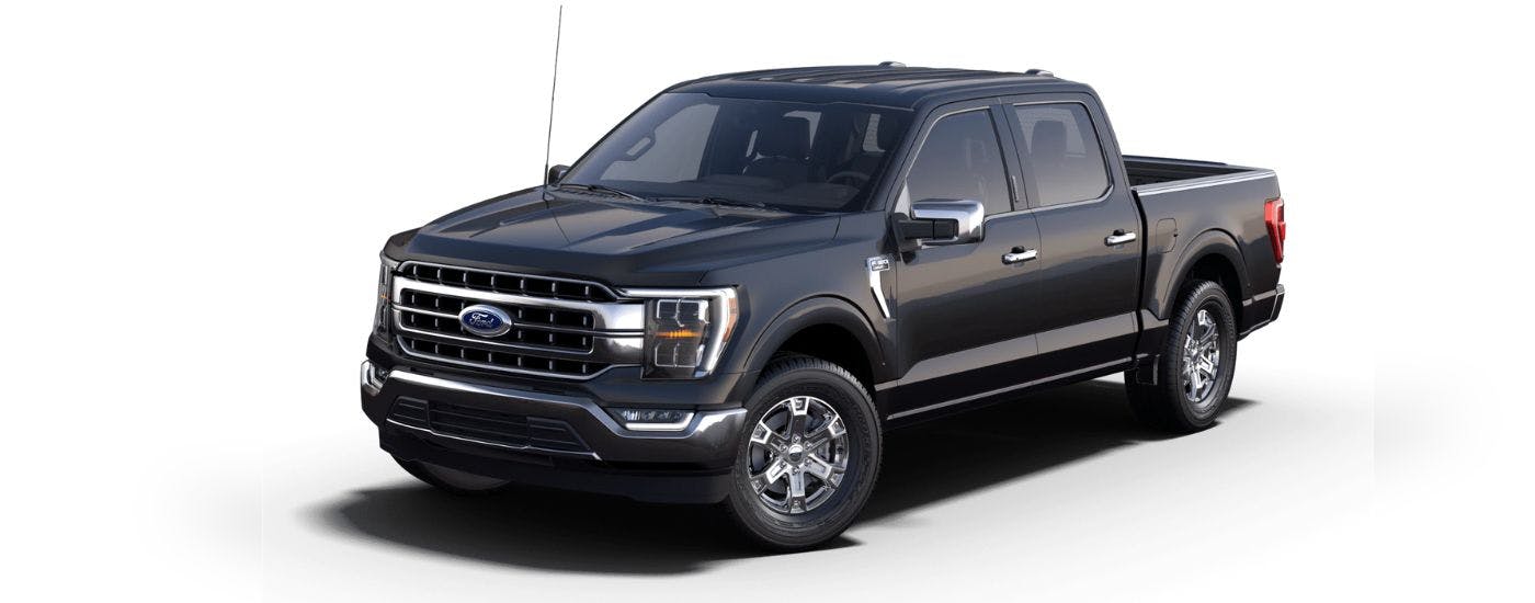 A black 2023 Ford F-150 Lariat is shown angled left.