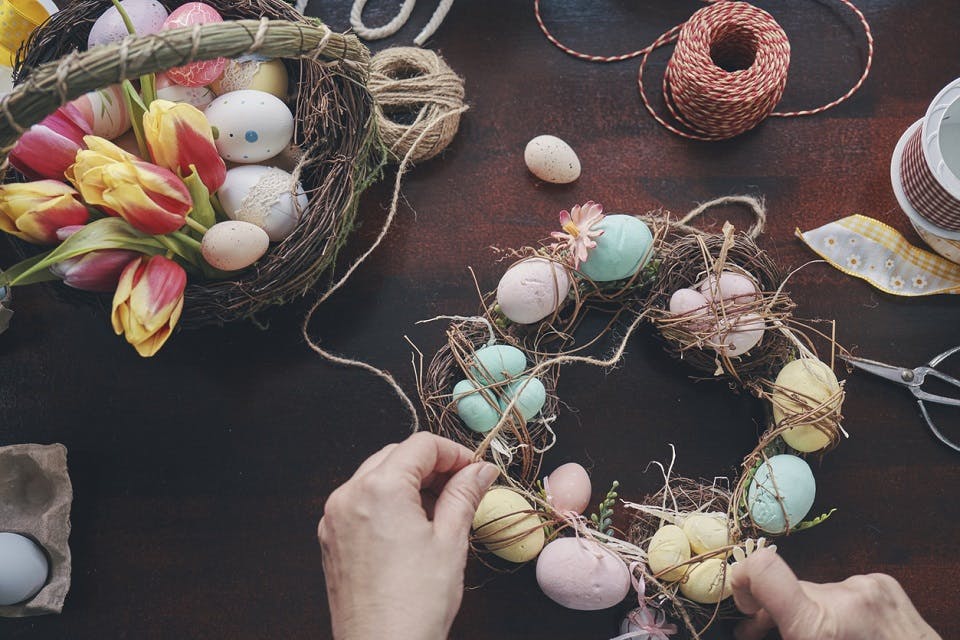 Preparing Easter Wreath with Easter Eggs