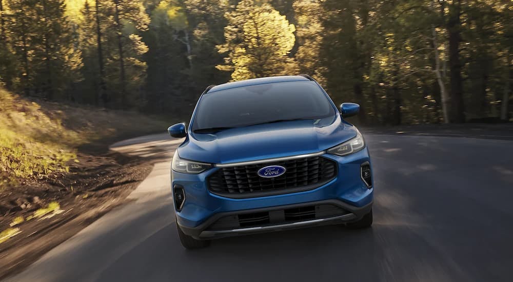 A blue 2023 Ford Escape is shown after leaving a Ford dealer in Westminster, VT.