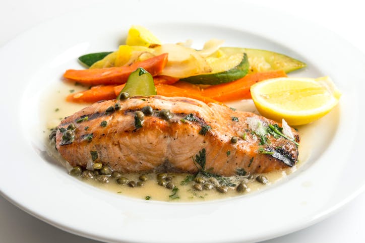Grilled Salmon fillet Sauteed with White Wine, Lemon, Capers, Parsley and, butter