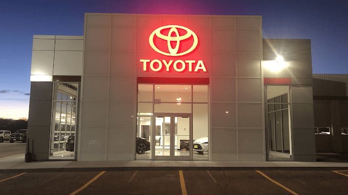 Premier Toyota Store front at dusk