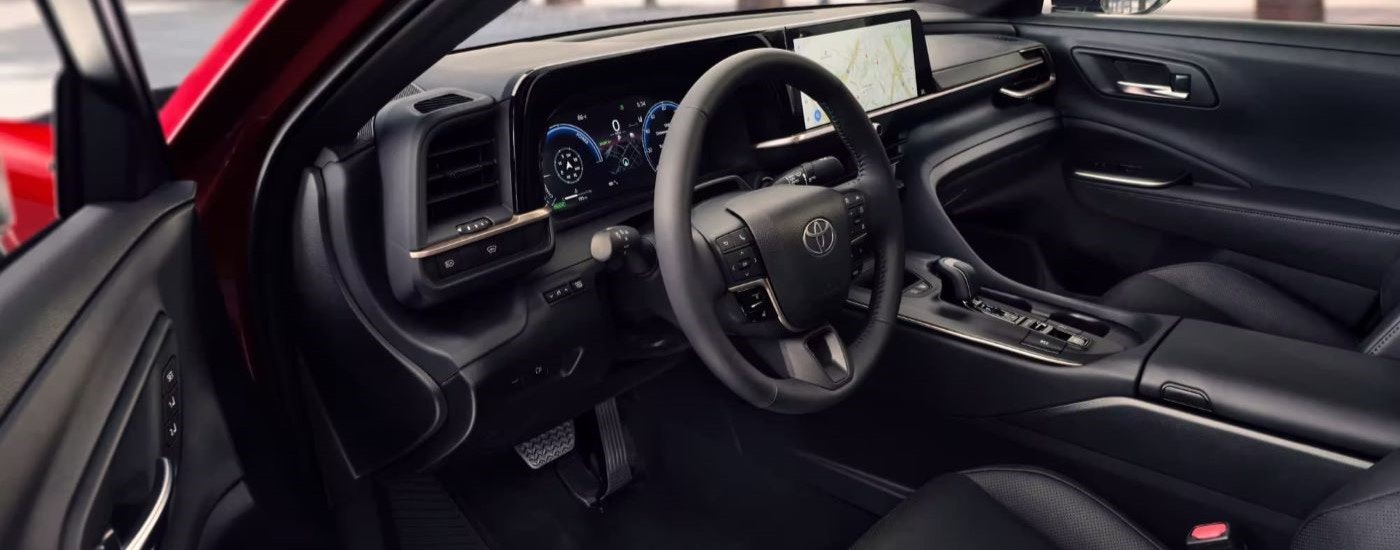 The black interior is shown in a 2023 Toyota Crown Platinum.