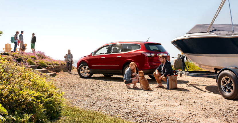 Family on vacation with their Chevy