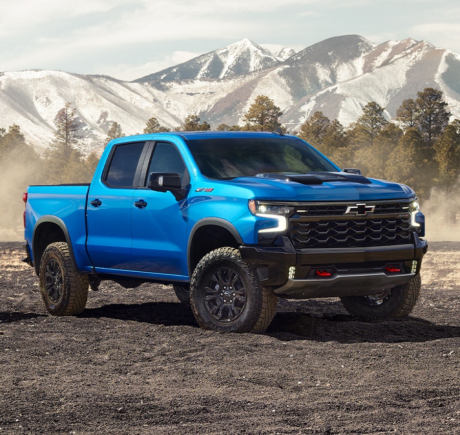 Silverado parked by the woods