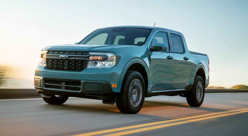 A grey 2022 Ford Maverick Hybrid XLT is shown from the front at an angle.