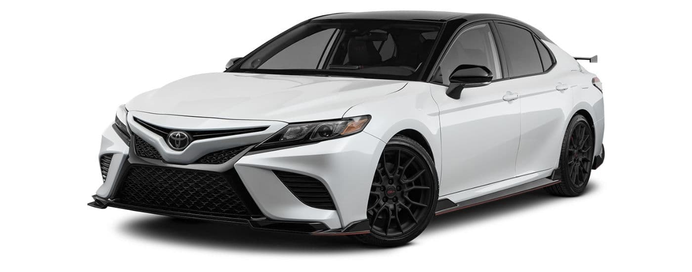 A white 2023 Toyota Camry TRD is angled left.