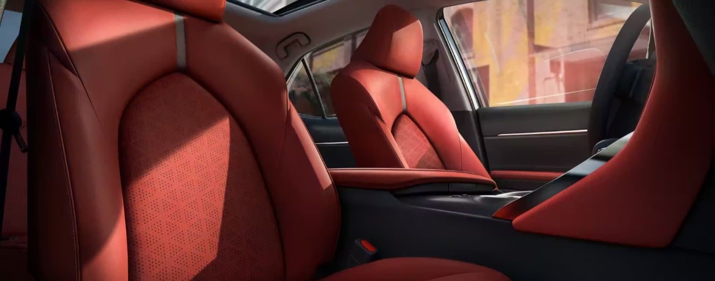 The red seats are shown in a 2024 Toyota Camry XSE.