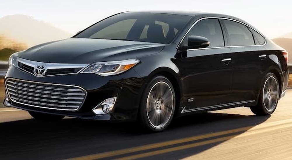 A black 2017 Toyota Avalon is shown from the front at an angle.