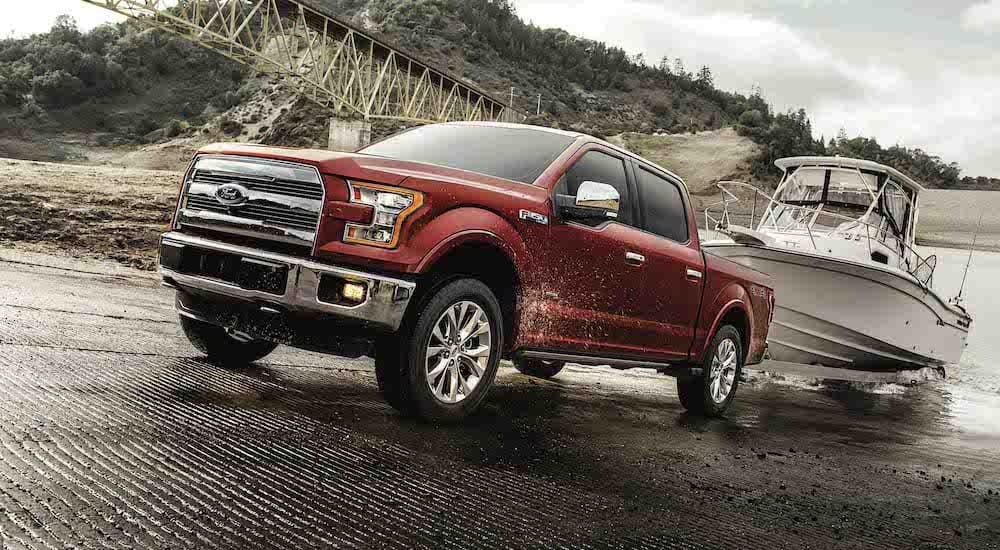 A red 2018 Ford F-150 is shown from the front at an angle.