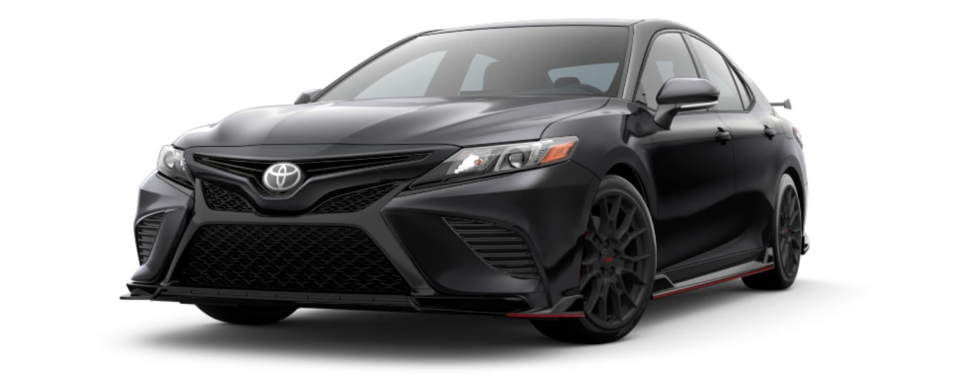 A black 2023 Toyota Camry TRD is angled left.