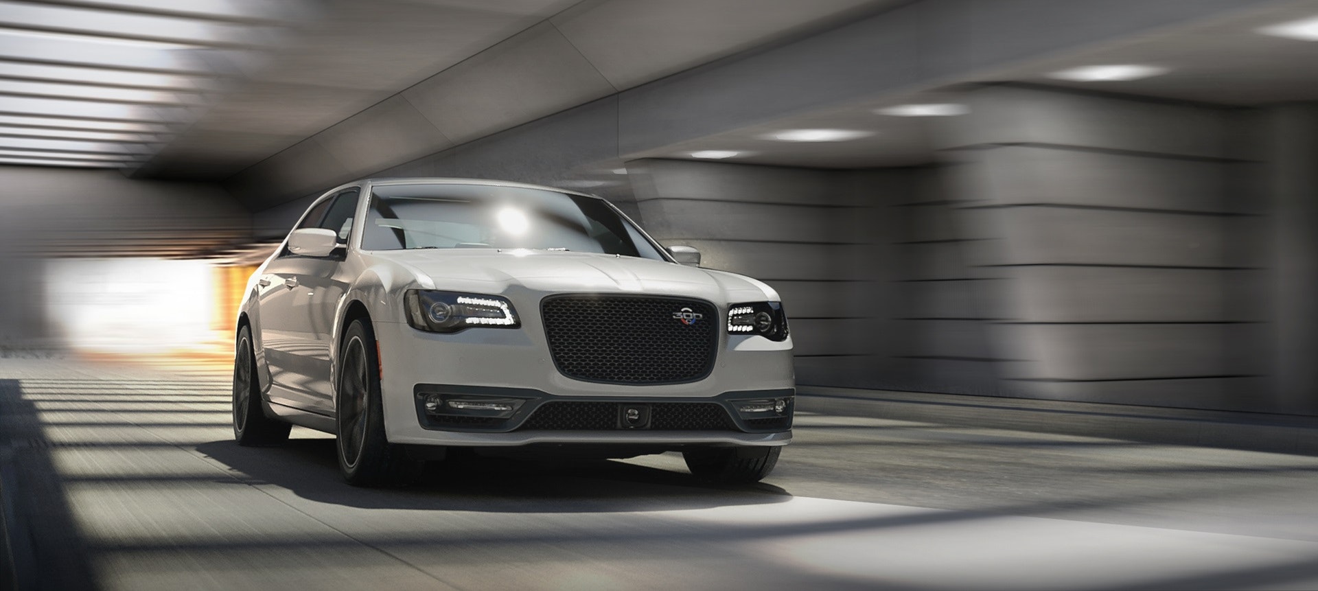 2023 Chrysler 300 driving in a parking garage