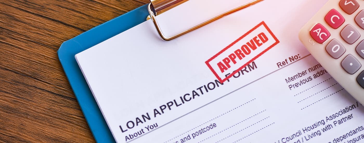 An approved loan application is shown after leaving a dealer that handles bad credit car loans near Bennington.