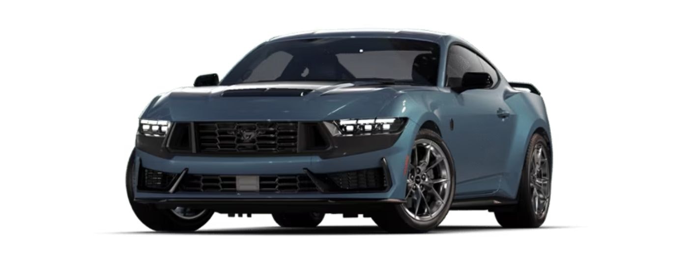 A blue 2024 Ford Mustang Dark Horse Premium is angled left.