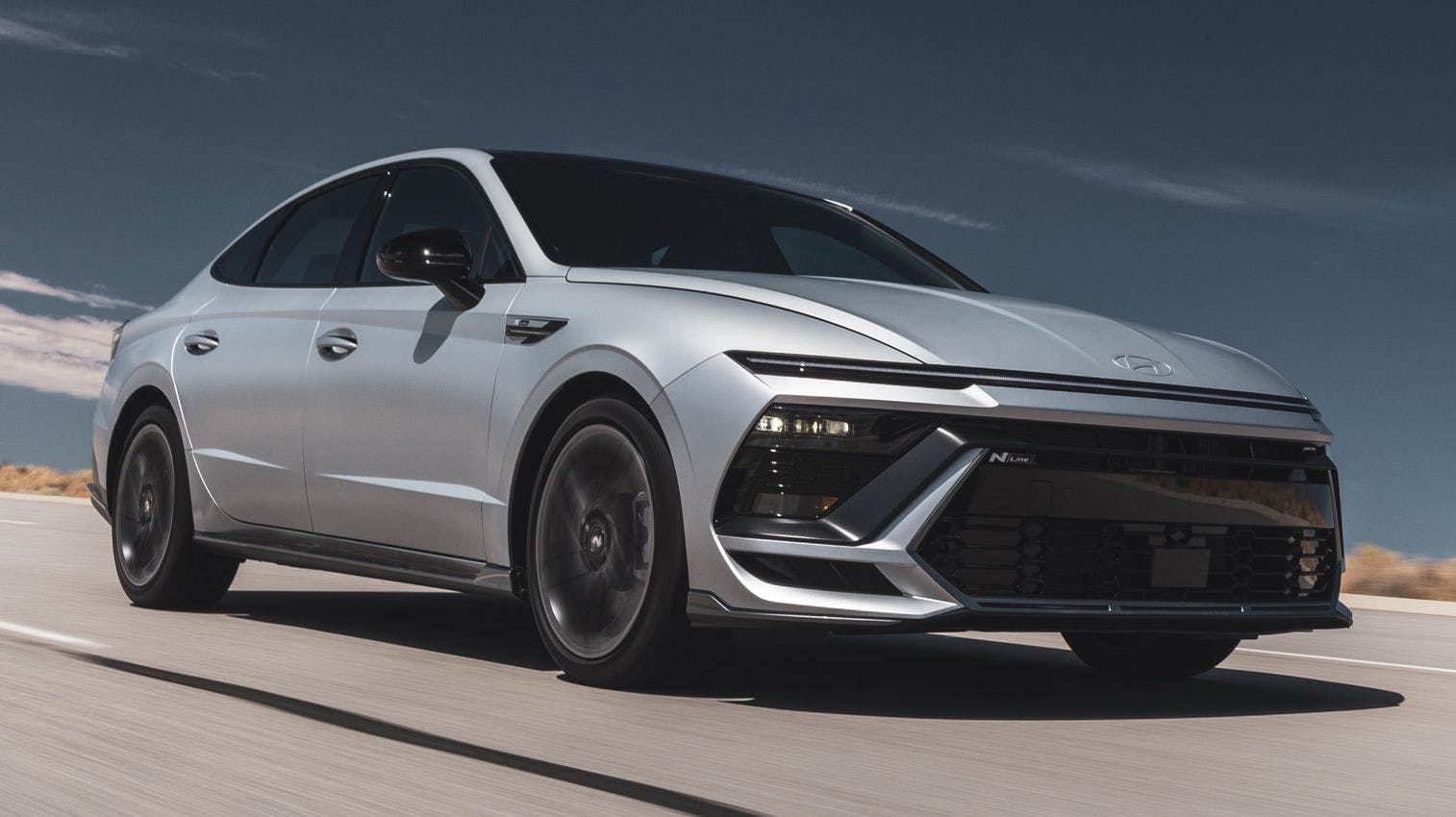 2024-hyundai-sonata-n-line-105-64ef8c4dbf981 2024 Hyundai Sonata N Line driving down the road
