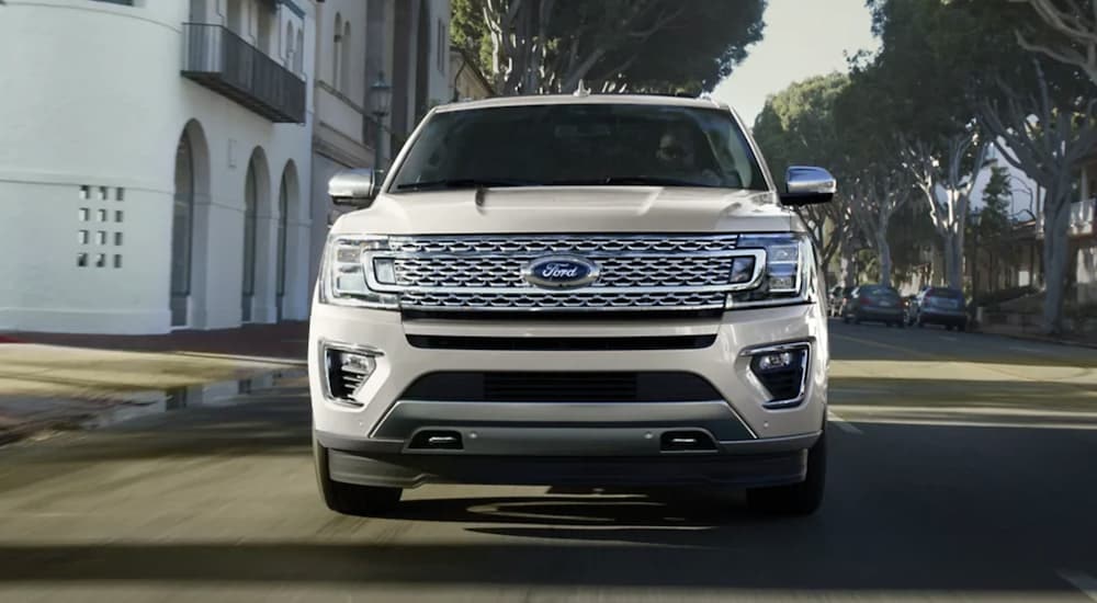 A white 2021 Ford Expedition is shown from the front.