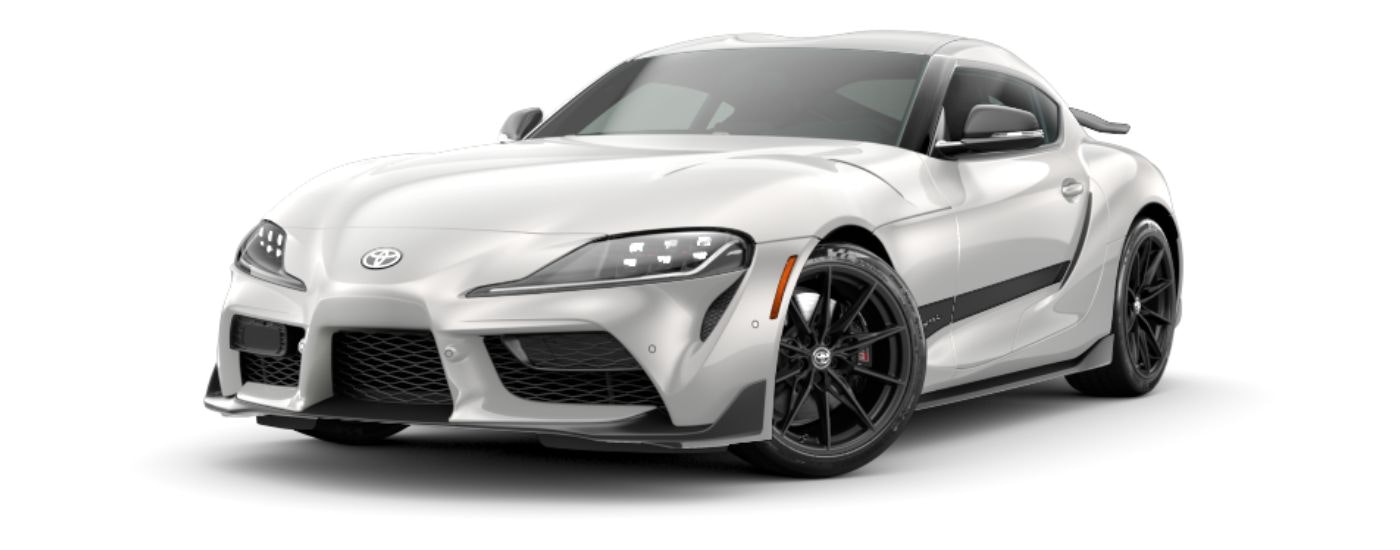 A white 2024 Toyota GR Supra 45th Anniversary Edition is angled left.