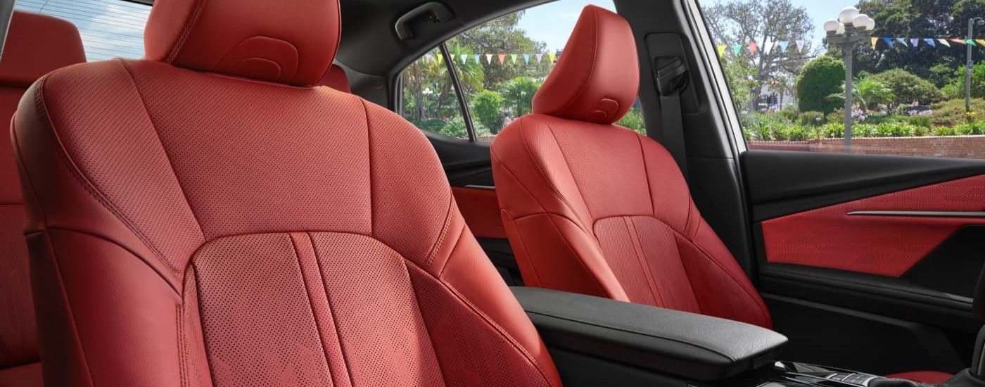 A close up shows the red leather seats in a 2025 Toyota Camry.