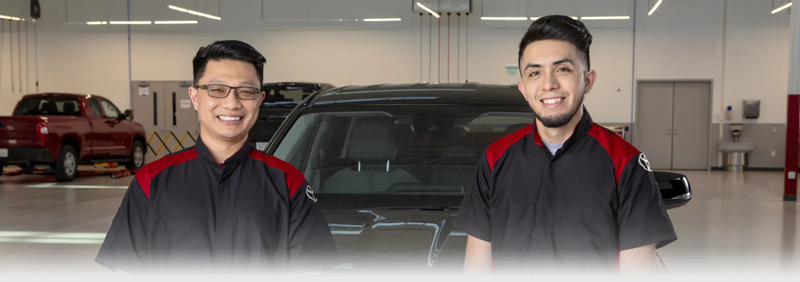 Toyota service technician working in the service bay
