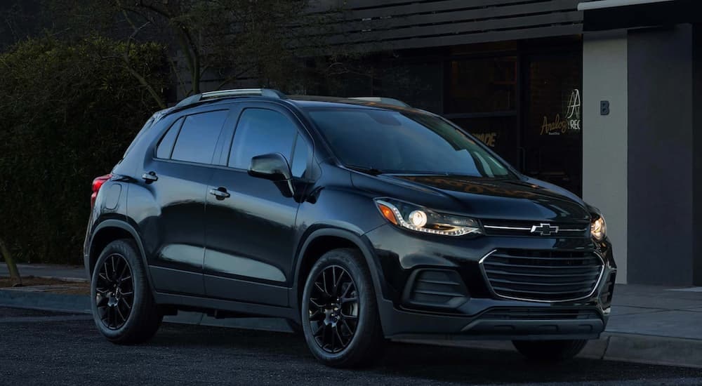 A black 2021 Chevy Trax is shown from the front at an angle.