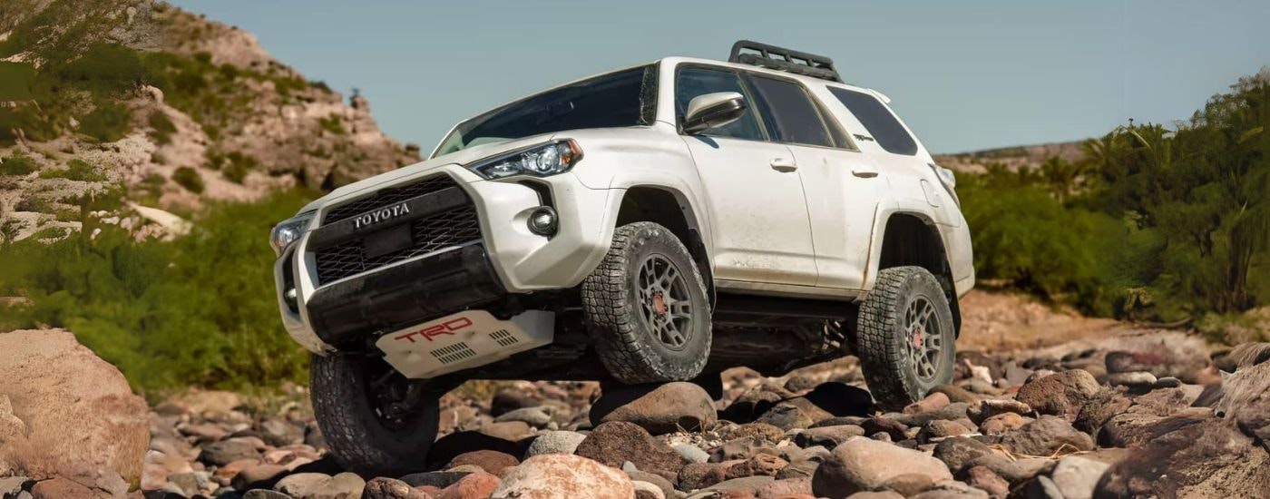 A white 2022 Toyota 4Runner TRD Pro is shown off-road.