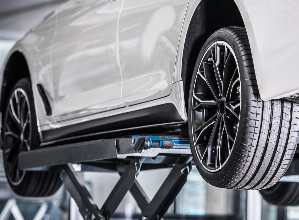 white sedan in the shop