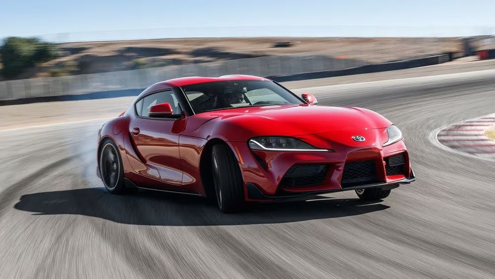 2020-toyota-gr-supra-launch-edition-4 2025 GR Supra driving around a racetrack