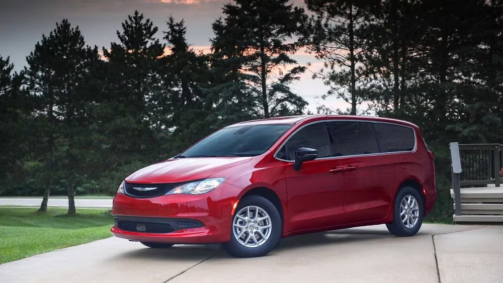 Chrysler Minivan parked in a driveway