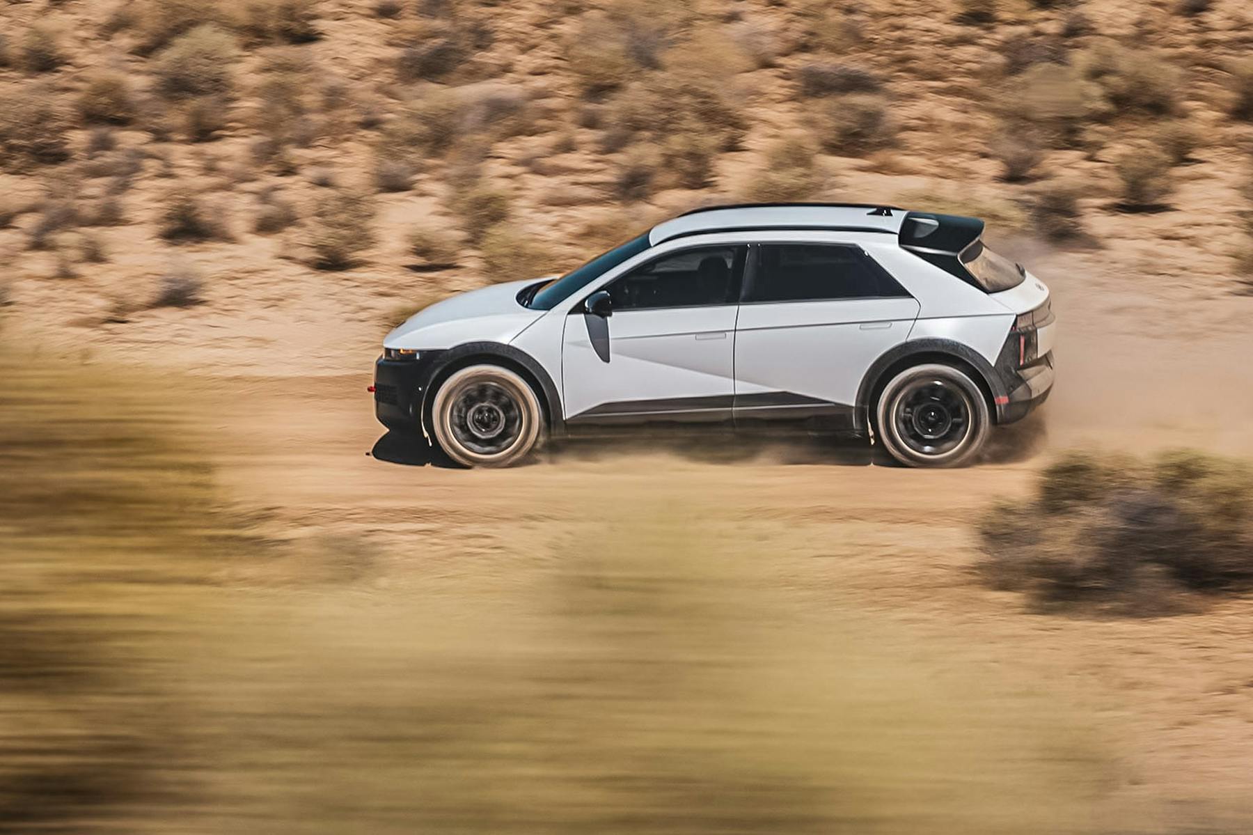 fw23prbm Hyundai Ioniq 5 XRT driving down a dirt road