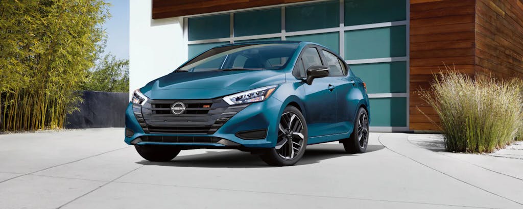 2025 Nissan Versa Blue Home Parked