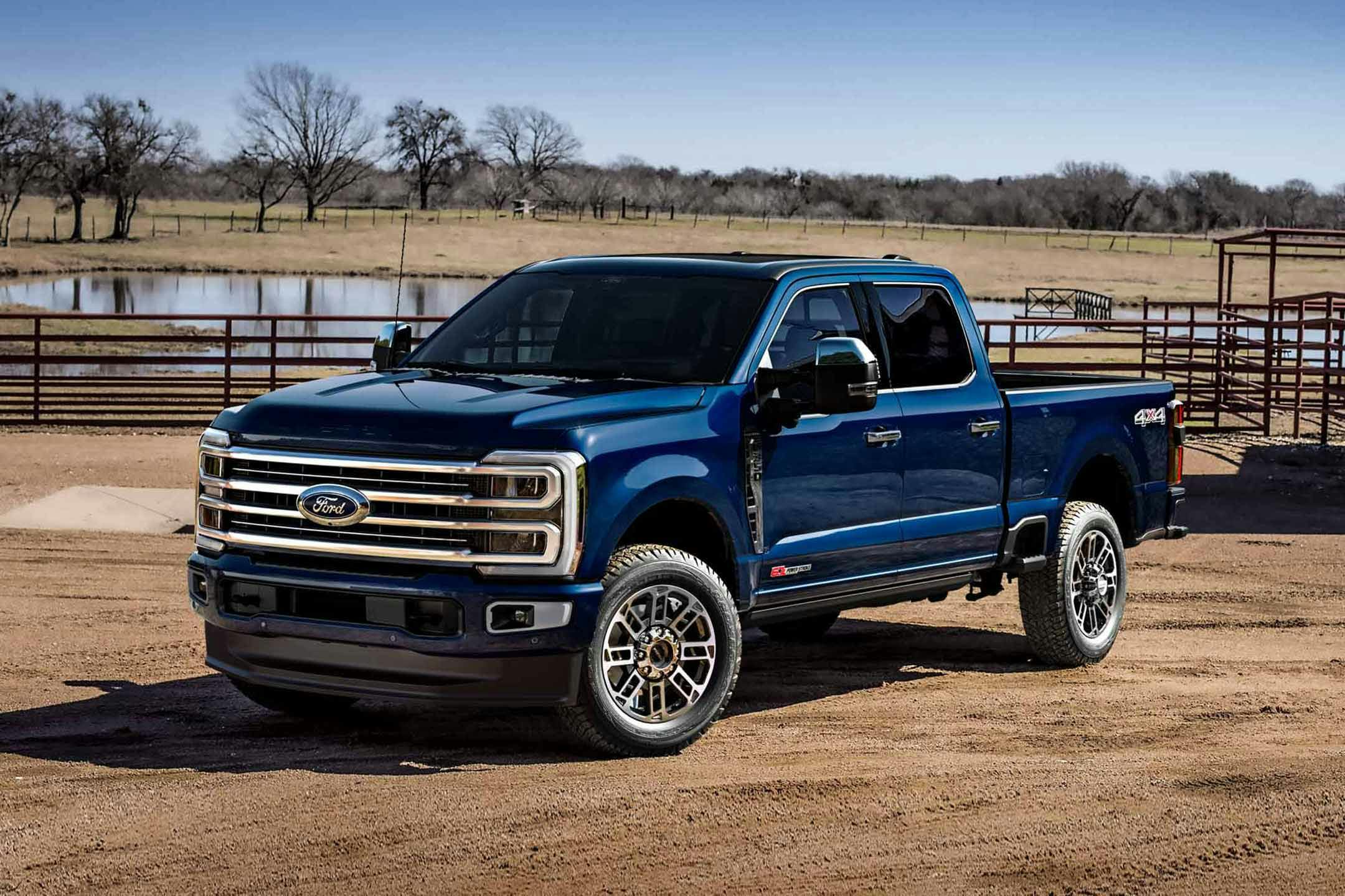 blue 2025 Ford F-Series Super Duty Platinum on a farm