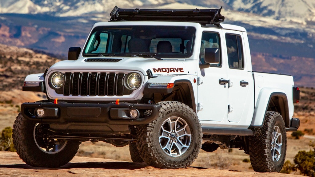 White 2025 Jeep Gladiator Mojave X on a desert road
