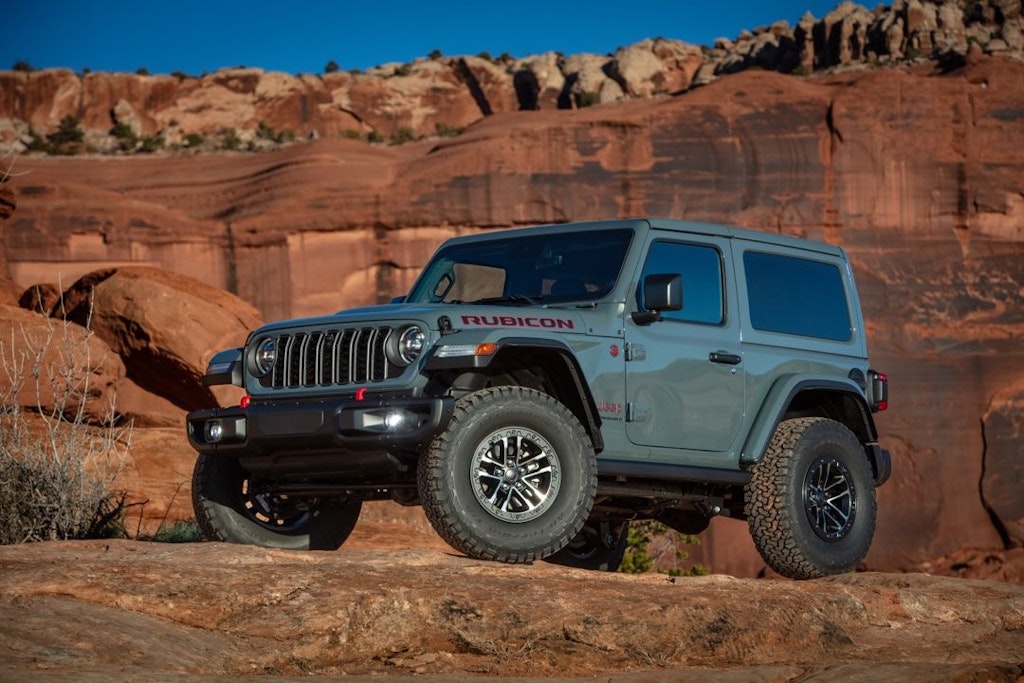 White 2025 Jeep Gladiator Mojave X on a desert road