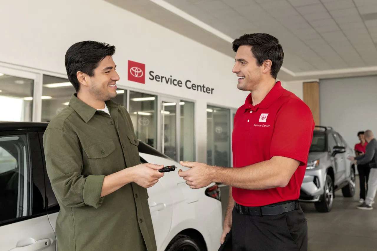 Toyota service representative and a customer