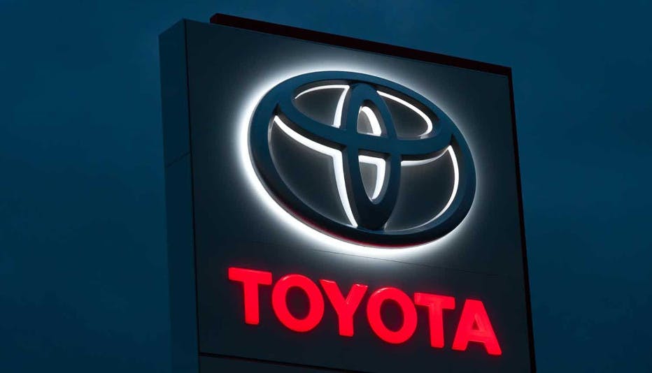 Toyota sign lite up at dusk