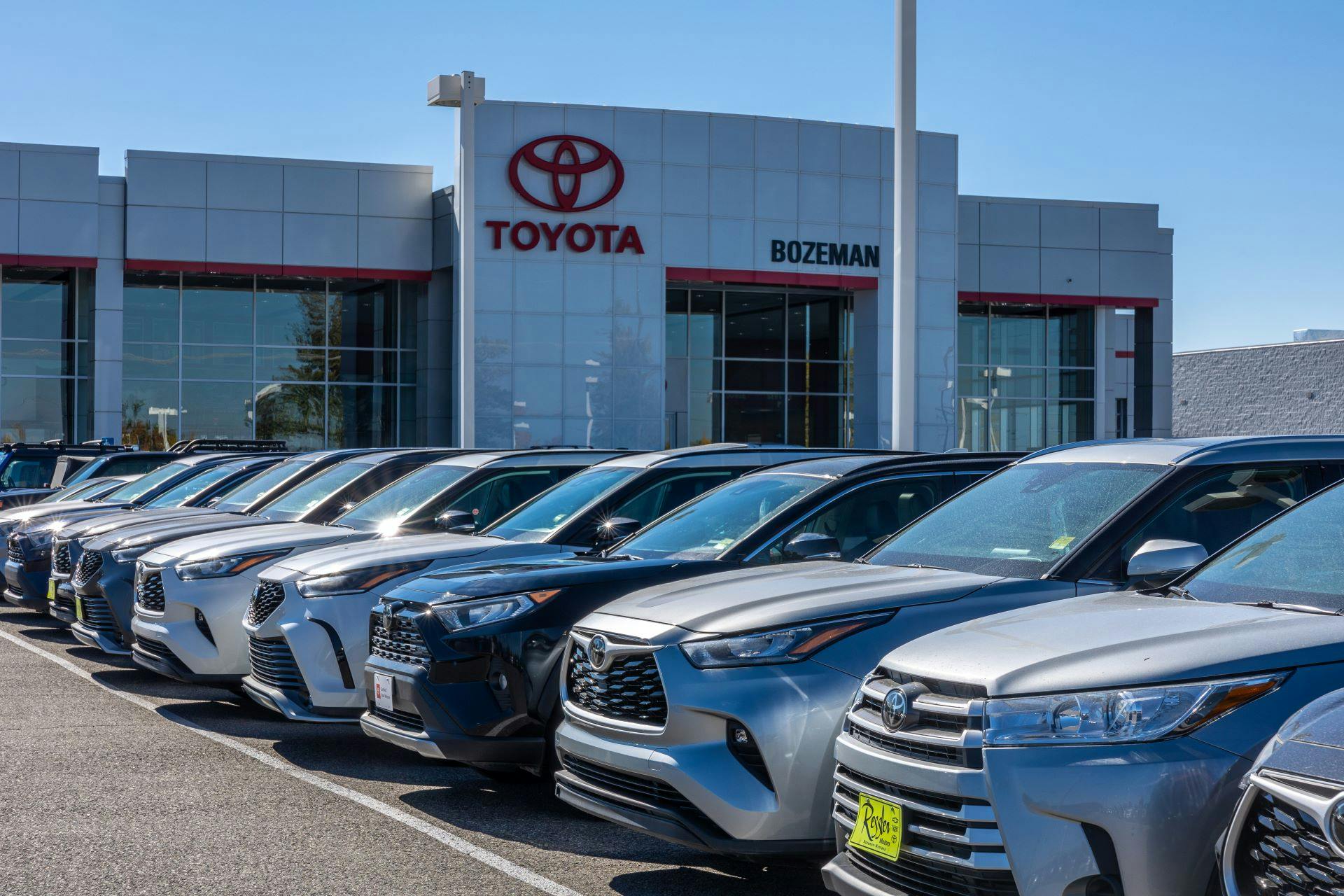 Assortment of Toyota highlander's and RAV 4's parked on Toyota of Bozeman lot