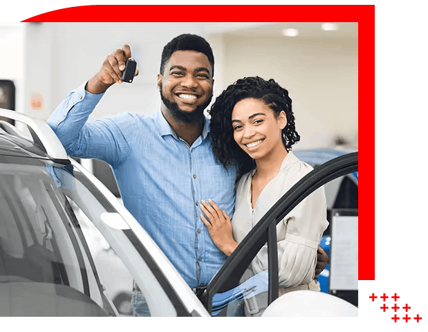 Happy Toyota customers hold up their keys