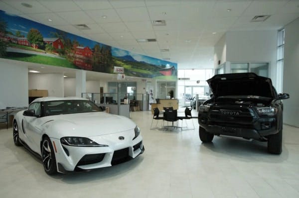 Our showroom at Coggins Toyota with new Supra and Tacoma on display