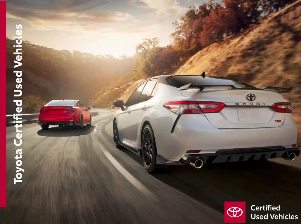 two toyota car on a road