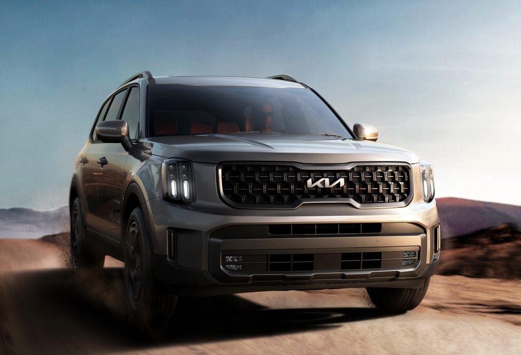 gray 2025 kia telluride on the road graphics