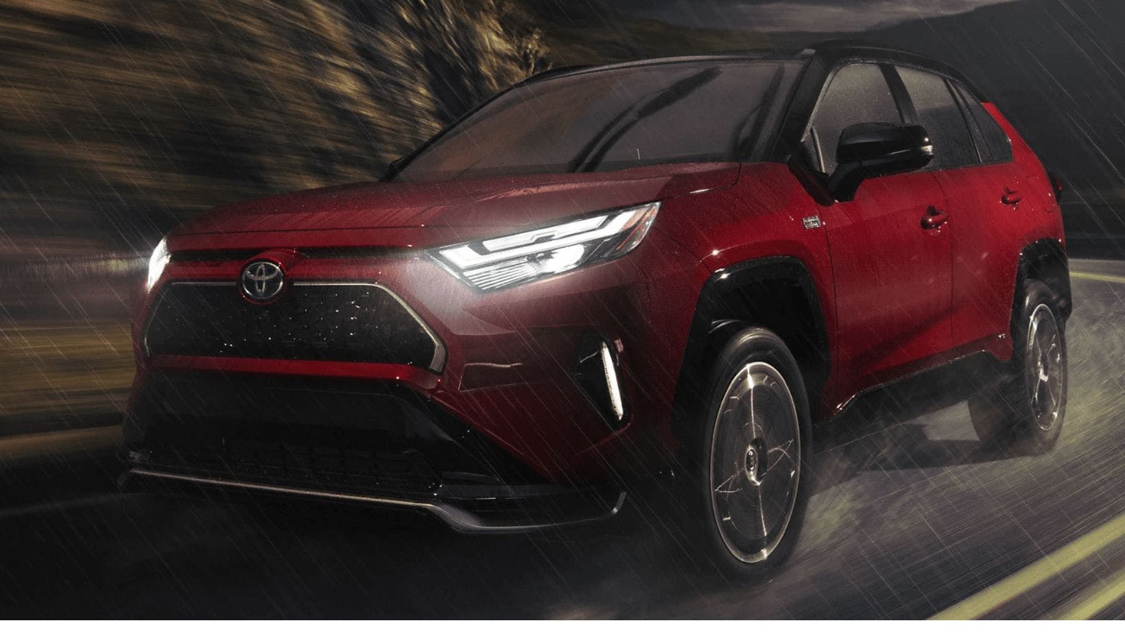 2023 red Rav4 in rain.