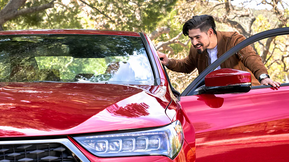 checking out a new red Honda